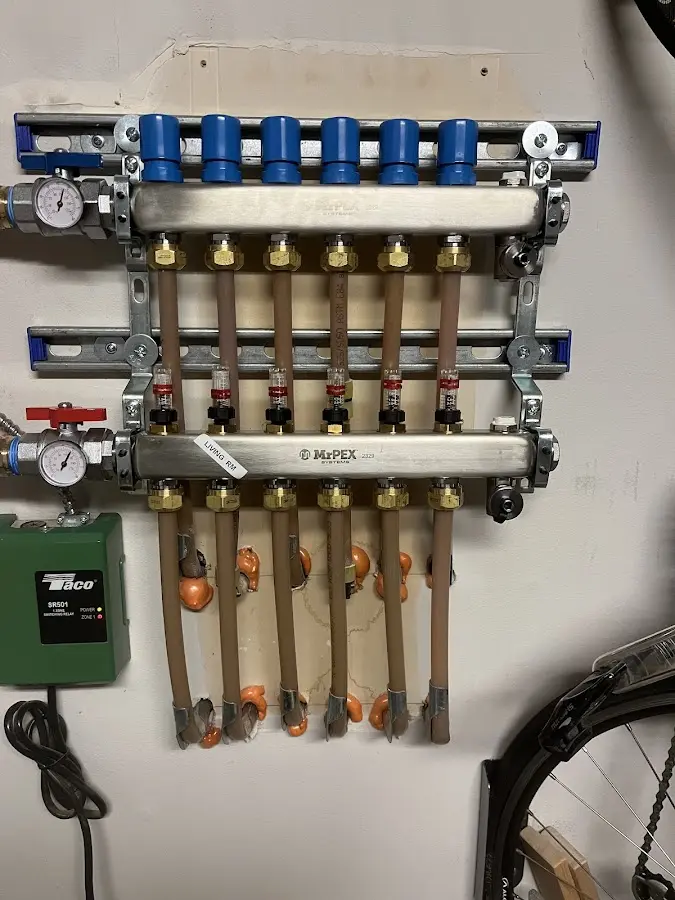 Plumber performing Gas Line Installation at a residential property in Harrison